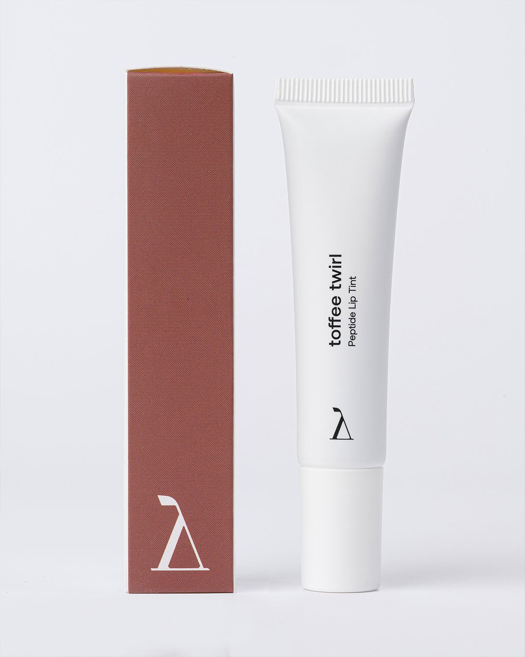 Toffee Twirl гланц за устни с пептиди и Витамин Ц | Yenges
